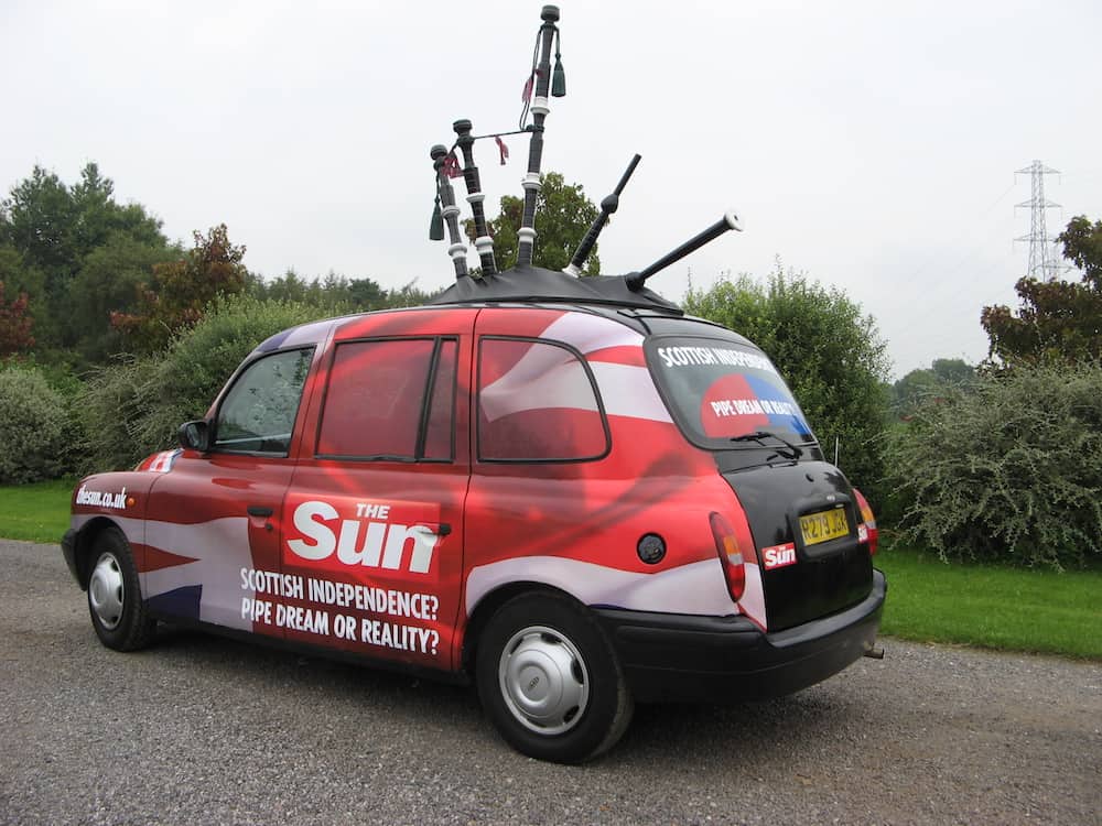 The Sun bagpipe taxi